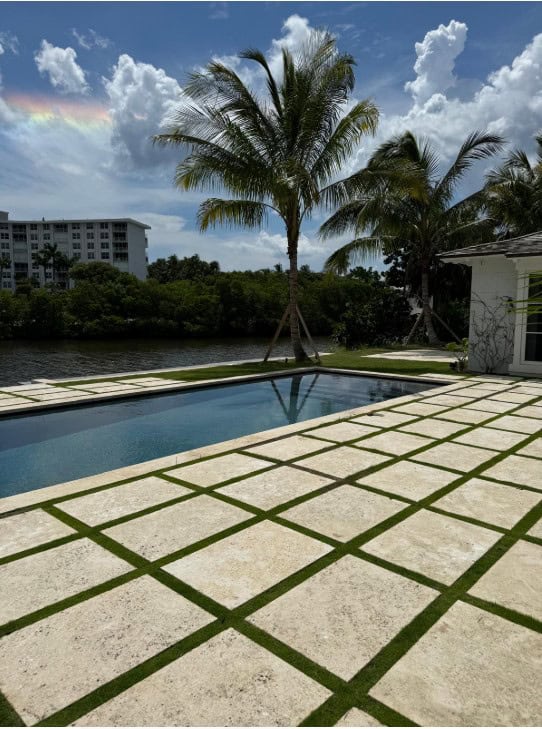 Transforming a Pool Deck in Palm Beach, Florida with Coral Stone Pavers and Copings