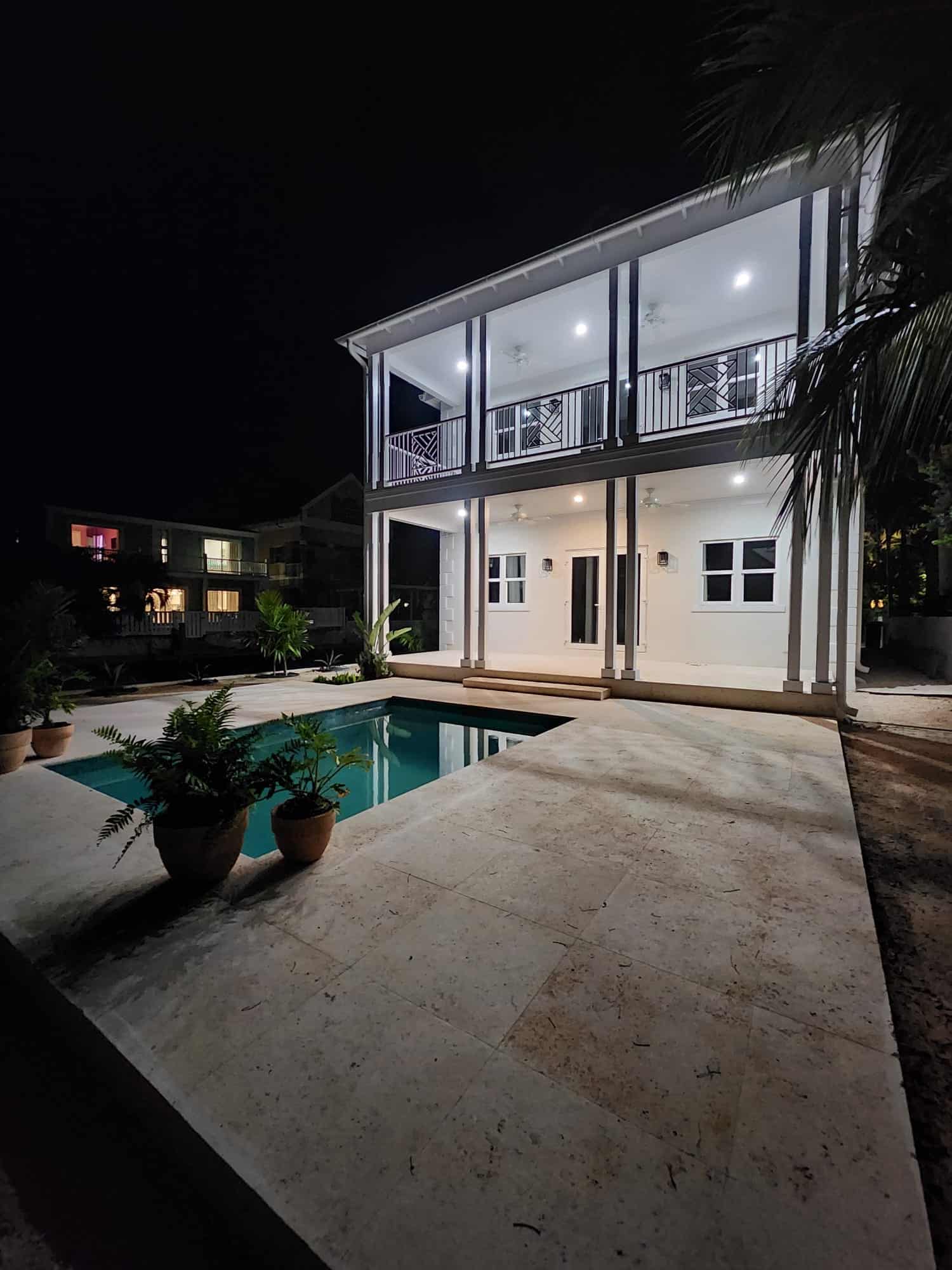 Elegance by Night: Coral Stone Tiles 24 24 Pool Deck in the Bahamas